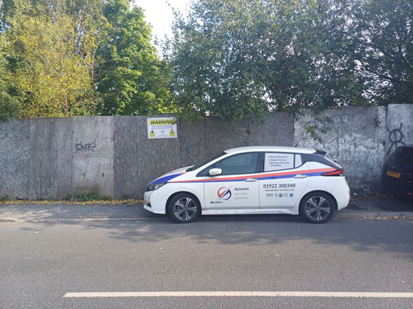 The Dynamic Security Services mobile patrol outside the gates of the derelict land in Wolverhampton.